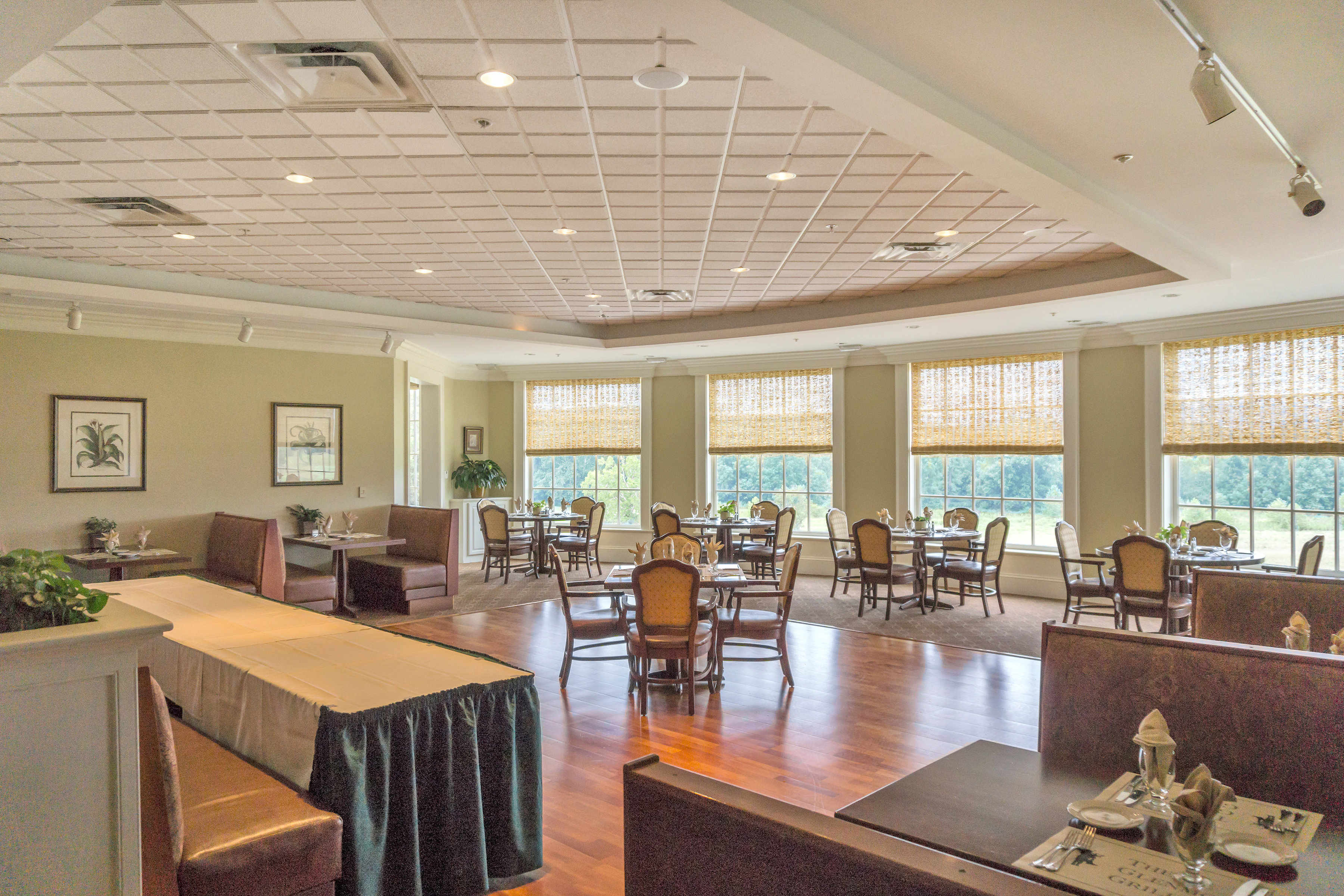Dining area in Glenmore Community with view out the windows